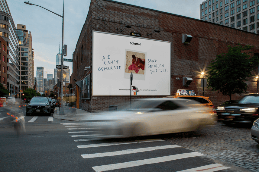 Ad mockup on NYC street of Polaroid’s flip campaign